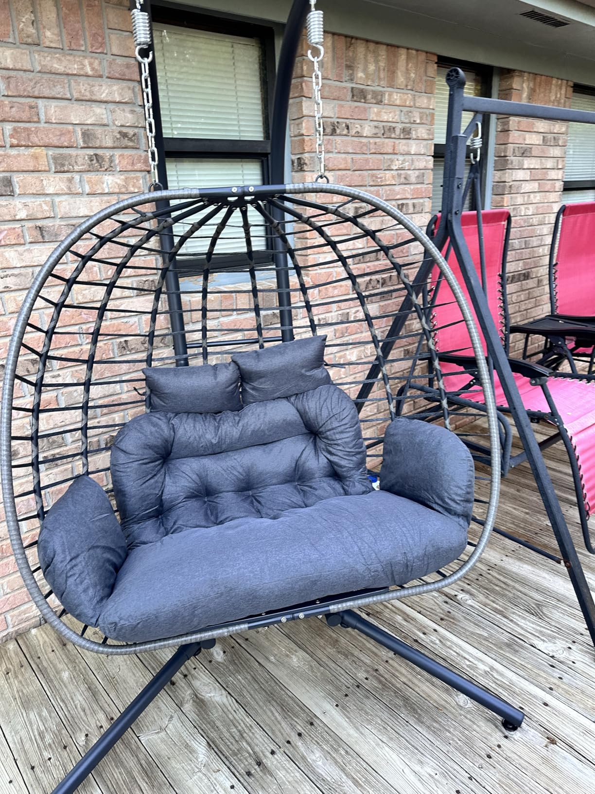 Hanging egg chair on terrace